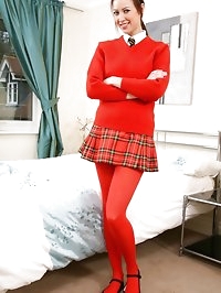 Carole wearing an all red college girl uniform.
